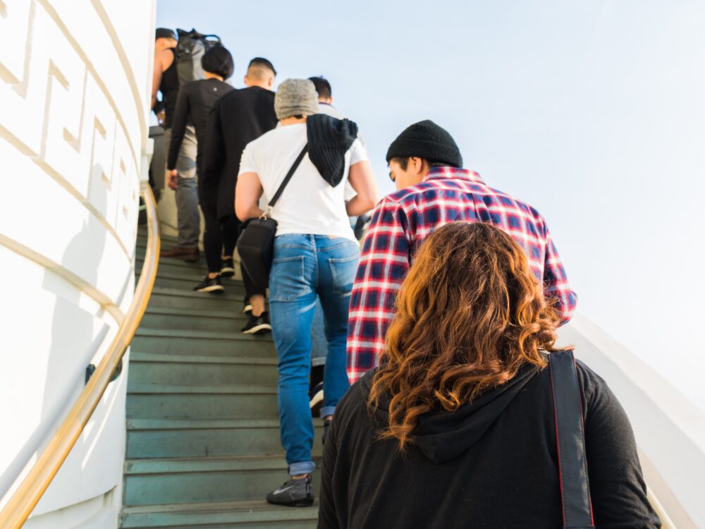 People climbing Observatory stairs. Photo by Levi Jones (https://unsplash.com/photos/n0CTq0rroso)