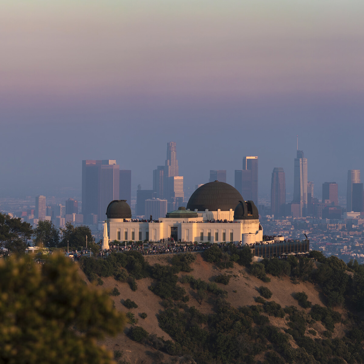 Side view of Griffith Observatory with Los Angeles in the background.