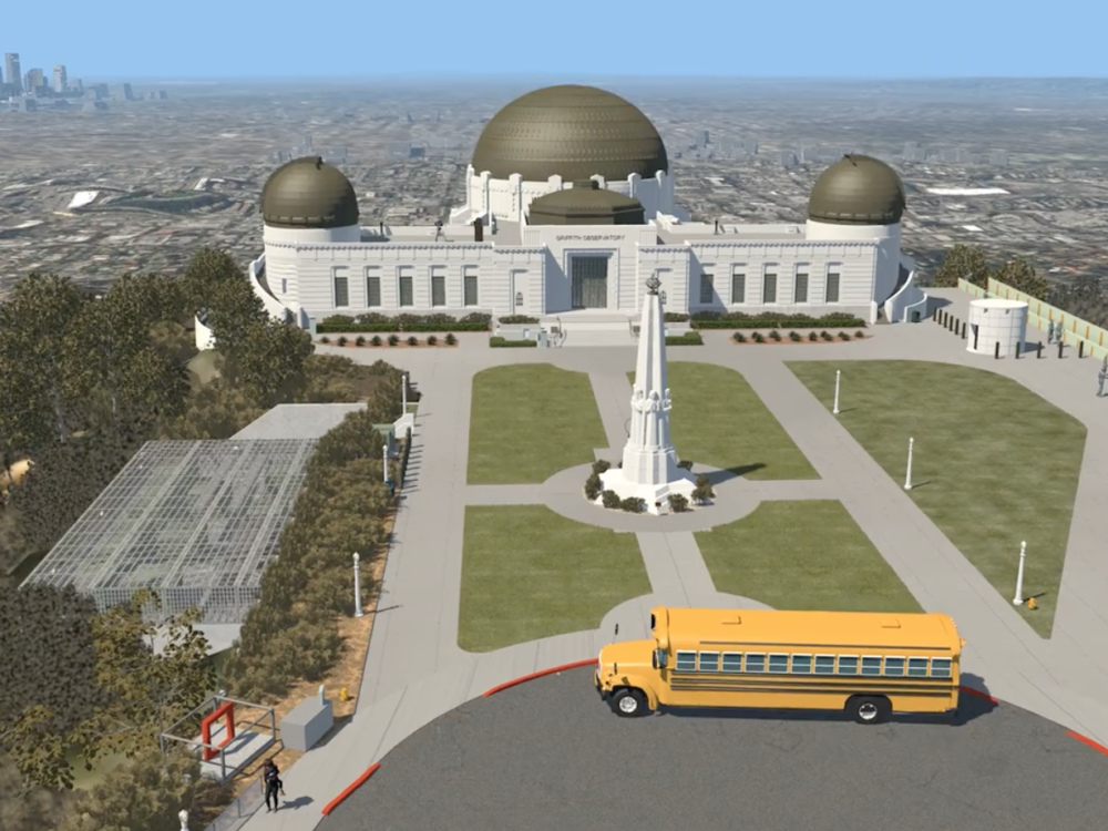 A digital mockup showing a yellow school bus parked in front of Griffith Observatory.