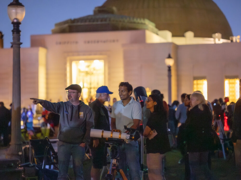 People gathered on the lawn for a star party.